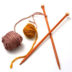 Knitting needles with yarn